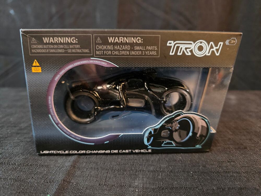 Disney Parks TRON Color-Changing Die-Cast Lightcycle โ Boxed